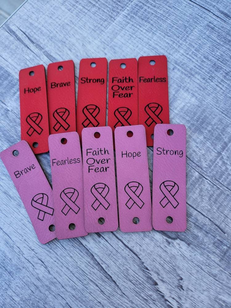 Cancer awareness faux leather tags with Hope, Strong, Brave, Fearless and Faith over Fear