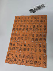 Full collection of 50 kids designs fold-over tags shown with rivet hardware